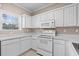 White kitchen with appliances and window view at 336 Kiskadee Loop # B, Conway, SC 29526
