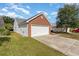 Attached brick garage with a long driveway at 419 Mckendree Ln., Myrtle Beach, SC 29579