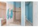 Updated bathroom with a walk-in shower and neutral tile at 419 Mckendree Ln., Myrtle Beach, SC 29579