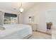 Bright bedroom with a queen-size bed and dresser, offering a peaceful atmosphere at 419 Mckendree Ln., Myrtle Beach, SC 29579