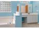 Clean bathroom with a bathtub, vanity, and updated fixtures at 419 Mckendree Ln., Myrtle Beach, SC 29579