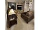 Cozy living room with fireplace, comfy seating and built-in shelving at 311 69Th Ave. N # 104, Myrtle Beach, SC 29572