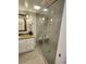 Bathroom with a walk-in shower and granite vanity at 311 69Th Ave. N # 104, Myrtle Beach, SC 29572