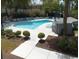 Inviting community pool with plenty of lounge chairs at 311 69Th Ave. N # 104, Myrtle Beach, SC 29572