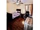 Cozy bedroom with a double bed, hardwood floors, and ample natural light at 196 Marsh Hawk Dr., Myrtle Beach, SC 29588