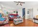 Living room with hardwood floors, leather furniture, and stairs at 154 Terracina Circle, Myrtle Beach, SC 29588