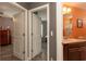 Bathroom with dark vanity and orange walls at 154 Terracina Circle, Myrtle Beach, SC 29588