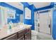 Bathroom with blue walls, shower, toilet and vanity at 154 Terracina Circle, Myrtle Beach, SC 29588