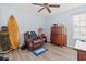 Bedroom with leather recliner, dresser, and surfboard at 154 Terracina Circle, Myrtle Beach, SC 29588