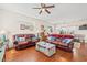 Spacious living room with hardwood floors and leather sofas at 154 Terracina Circle, Myrtle Beach, SC 29588
