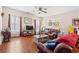 Living room featuring hardwood floors, a TV, and a comfy sofa at 154 Terracina Circle, Myrtle Beach, SC 29588