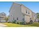Two story tan house with walkway and lawn at 154 Terracina Circle, Myrtle Beach, SC 29588