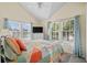 Cozy bedroom with a queen bed and plenty of natural light at 6001-7038 S Kings Hwy., Myrtle Beach, SC 29575