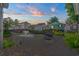 Charming backyard pond with fountain, wooden deck, and views of neighboring houses at 6001-7038 S Kings Hwy., Myrtle Beach, SC 29575