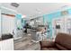 Kitchen with gray cabinets, granite counters, and breakfast bar at 6001-7038 S Kings Hwy., Myrtle Beach, SC 29575