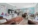 Spacious living room with comfortable seating and large TV at 6001-7038 S Kings Hwy., Myrtle Beach, SC 29575