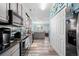 Gray kitchen with stainless steel appliances and mosaic backsplash at 6001-7038 S Kings Hwy., Myrtle Beach, SC 29575