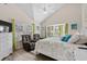 Spacious main bedroom with a king-size bed and sitting area at 6001-7038 S Kings Hwy., Myrtle Beach, SC 29575
