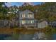House by the water with backyard deck and fountain at 6001-7038 S Kings Hwy., Myrtle Beach, SC 29575