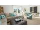 Spacious playroom with L-shaped sofa, chalkboard wall, and fun decor at 5063 Selene Ct., Myrtle Beach, SC 29588