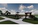 Community playground with playset, swings, and shaded seating at 5063 Selene Ct., Myrtle Beach, SC 29588