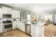 Open kitchen with stainless steel appliances and granite countertops at 5063 Selene Ct., Myrtle Beach, SC 29588