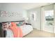 Bedroom with a daybed, dresser, and access to a porch at 5063 Selene Ct., Myrtle Beach, SC 29588