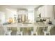Bright kitchen with granite countertops, stainless steel appliances, and white cabinets at 5063 Selene Ct., Myrtle Beach, SC 29588