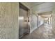 Building hallway with elevator access and exit at 14290 Ocean Hwy. # 202, Pawleys Island, SC 29585