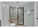 Clean bathroom with a large shower and built-in seat at 14290 Ocean Hwy. # 202, Pawleys Island, SC 29585
