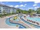Large resort-style pool with lazy river and water features at 14290 Ocean Hwy. # 202, Pawleys Island, SC 29585