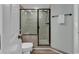 Clean bathroom with a large shower and built-in seat at 14290 Ocean Hwy. # 202, Pawleys Island, SC 29585