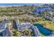 Aerial view of community, pool, and pond at 14290 Ocean Hwy. # 202, Pawleys Island, SC 29585