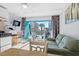 Living room with ocean view, sofa, and access to balcony at 1600 S Ocean Blvd. # 346, Myrtle Beach, SC 29577