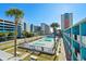Complex pool area with palm trees and parking at 1600 S Ocean Blvd. # 346, Myrtle Beach, SC 29577