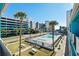 Community pool with surrounding buildings and landscaping at 1600 S Ocean Blvd. # 346, Myrtle Beach, SC 29577