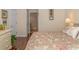 Bedroom with hardwood floors, dresser and a view of another room at 5804 Longwood Dr. # 203, Murrells Inlet, SC 29576