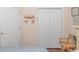 Bedroom with double doors and closet, offering ample storage at 5804 Longwood Dr. # 203, Murrells Inlet, SC 29576