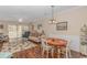 Condo living room with coastal decor and access to balcony at 5804 Longwood Dr. # 203, Murrells Inlet, SC 29576