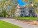 Building exterior with walkway and landscaping at 5804 Longwood Dr. # 203, Murrells Inlet, SC 29576