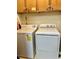Bright laundry room, featuring a washer and dryer at 9580 Shore Dr. # 303, Myrtle Beach, SC 29572