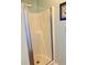 Shower stall with glass door and neutral colors at 9580 Shore Dr. # 303, Myrtle Beach, SC 29572