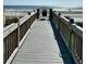 Boardwalk leads to beach access at 9580 Shore Dr. # 303, Myrtle Beach, SC 29572