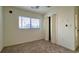 Well-lit bedroom with neutral walls, carpet, and a double door closet at 9661 Shore Dr. # A-38, Myrtle Beach, SC 29572