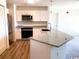 Modern kitchen with granite countertops and stainless steel appliances at 9661 Shore Dr. # A-38, Myrtle Beach, SC 29572
