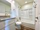 Updated bathroom with granite vanity, tub/shower combo, and tile flooring at 9661 Shore Dr. # A-38, Myrtle Beach, SC 29572
