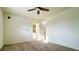Spacious bedroom with carpeted flooring and an adjoining bathroom at 9661 Shore Dr. # A-38, Myrtle Beach, SC 29572