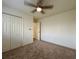 Spacious bedroom with double door closet and neutral colored carpet at 9661 Shore Dr. # A-38, Myrtle Beach, SC 29572
