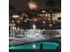 Night view of the community pool with fireworks display at 4220 Coquina Harbour Dr. # B-11, Little River, SC 29566