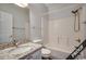Updated bathroom with granite vanity and a shower/tub combo at 4220 Coquina Harbour Dr. # B-11, Little River, SC 29566